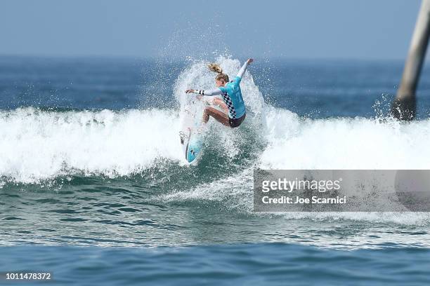 Lakey Peterson surfs against Courtney Conlogue in the women's quarterfinals at the Vans US Open of Surfing on August 5, 2018 in Huntington Beach,...