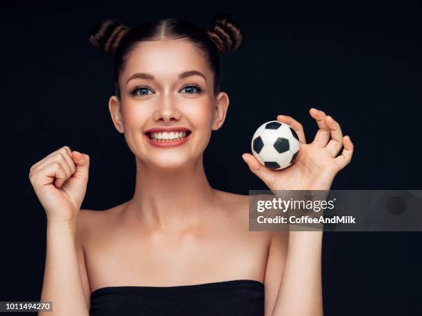 young beautiful woman - super fan stock pictures, royalty-free photos & images