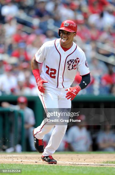 Juan Soto of the Washington Nationals reacts after drawing a walk in the third inning against the Cincinnati Reds at Nationals Park on August 5, 2018...