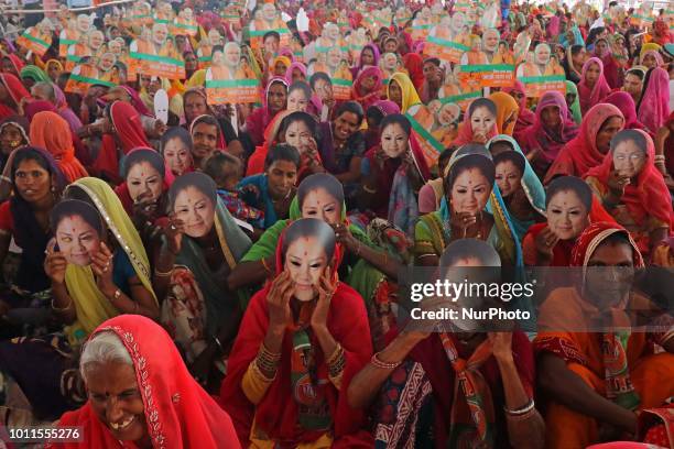 Supporters cheer during a public meeting in which BJP President Amit Shah and Rajasthan Chief Minister Vasundhara Raje with other leaders starts...