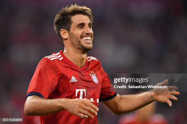 Javier Martinez of Bayern Muenchen celebrates scoring his teams first goal during the friendly match between Bayern Muenchen and Manchester United at...