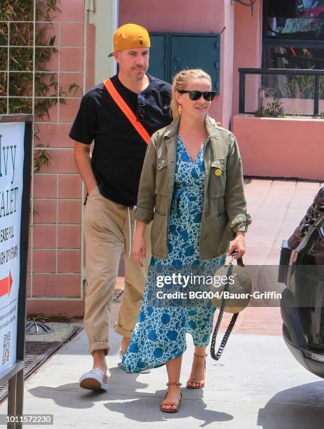 Jim Toth and Reese Witherspoon are seen on August 05, 2018 in Los Angeles, California.