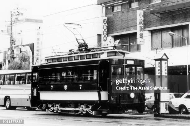 Tram of the Tosa Electric Railway runs near Harimaya-Bashi on January 3, 1985 in Kochi, Japan.