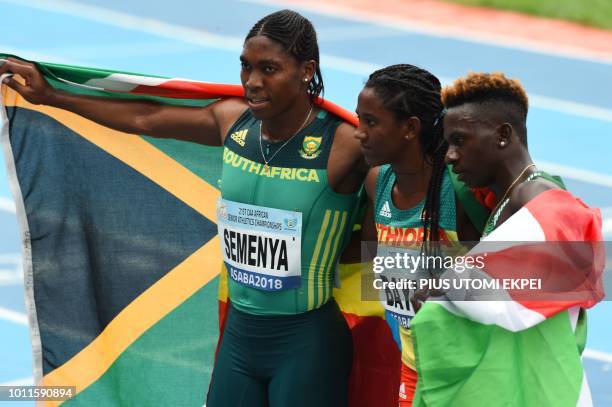 South-Africa gold medalist Caster Semenya pose with Ethiopia bronze medalist Bayih Alemu and silver Burundi Francine Niyonsaba after the women's 800m...