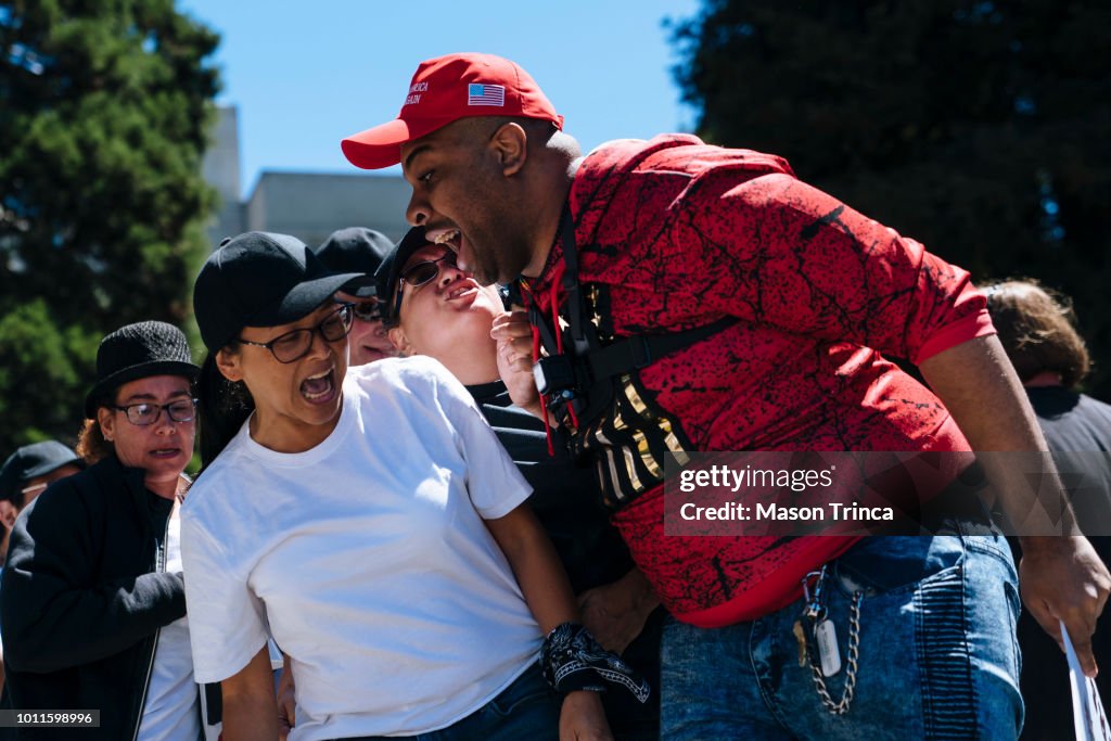 Marxist Rally A counter protestor and a anti-communist protestor yell at each other ...