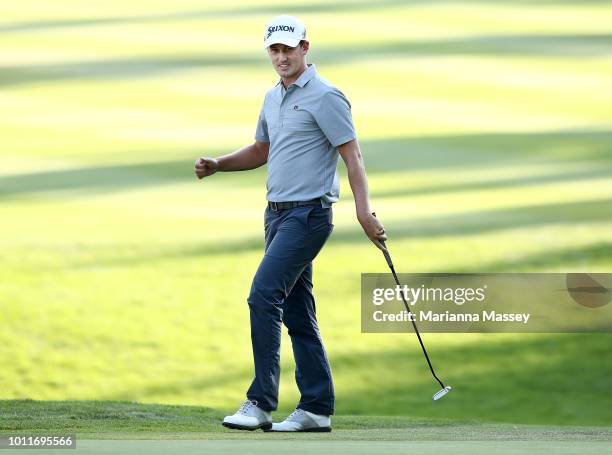 Andrew Putnam reacts after putting in for birdie on the 18th hole during the final round of the Barracuda Championship at Montreux Country Club on...