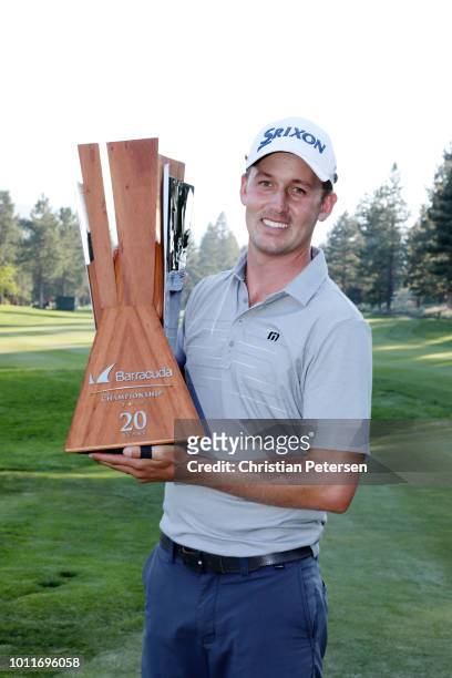 Andrew Putnam poses with the trophy on the 18th hole during the final round of the Barracuda Championship at Montreux Country Club on August 5, 2018...