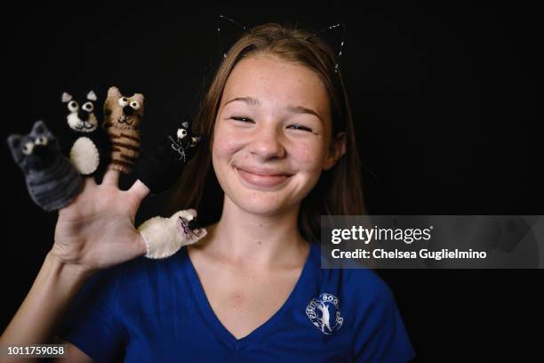 An attendee poses at CatCon Worldwide 2018 at Pasadena Convention Center on August 5, 2018 in Pasadena, California.