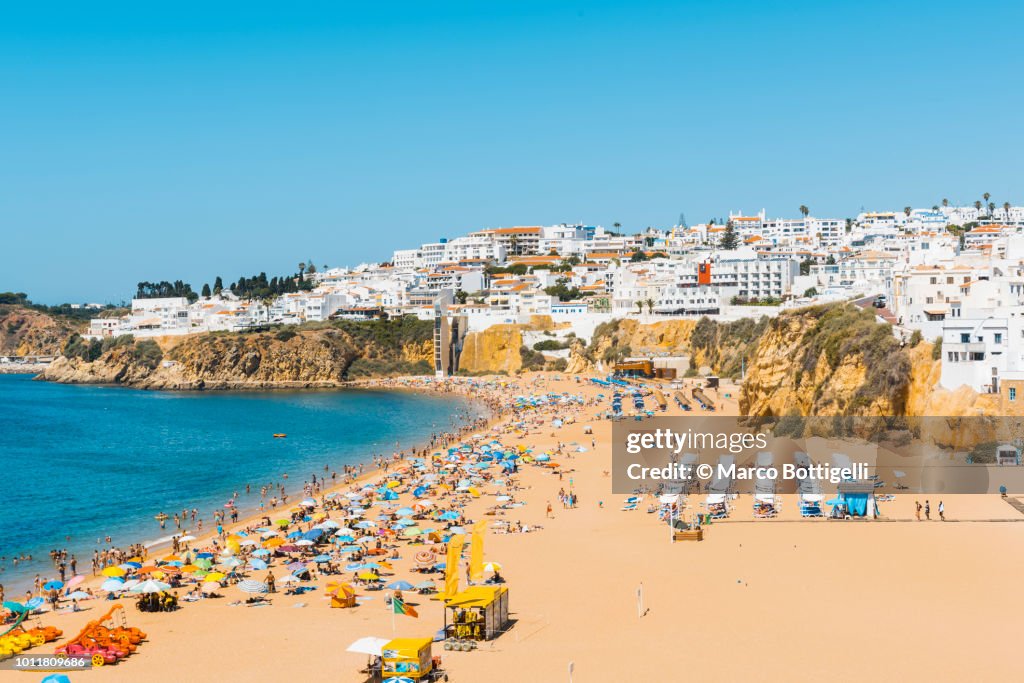 People on the beach in summer, Algarve, Portugal