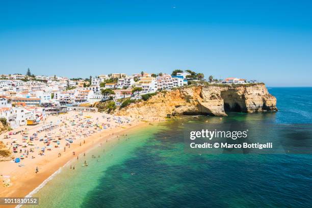 summer beach in algarve, portugal - carvoeiro fotografías e imágenes de stock