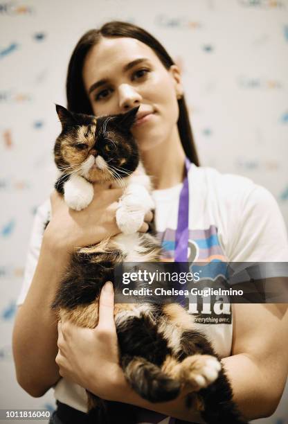 Pudge the Cat and Kady Lone attend CatCon Worldwide 2018 at Pasadena Convention Center on August 5, 2018 in Pasadena, California.
