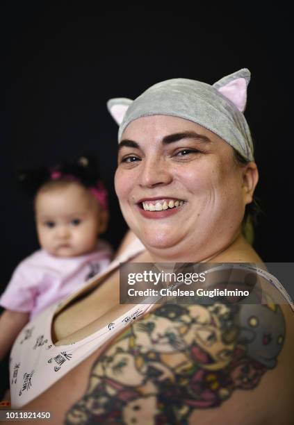 Attendees pose at CatCon Worldwide 2018 at Pasadena Convention Center on August 5, 2018 in Pasadena, California.