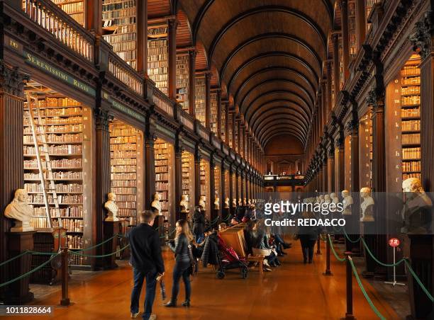 Long Room interior Old Library building 18th century Trinity College Dublin Republic of Ireland Europe.