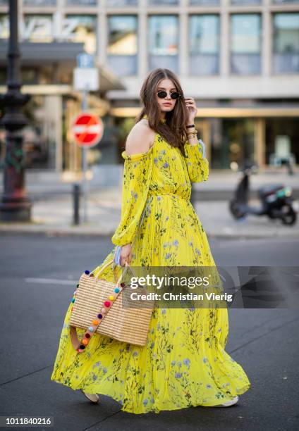 Maxilie Mlinarskij wearing yellow maxi dress Self Portrait, Nannacay bag, Nike M2K Tekno sneakers, Ray Ban sunglasses on August 5, 2018 in Berlin,...