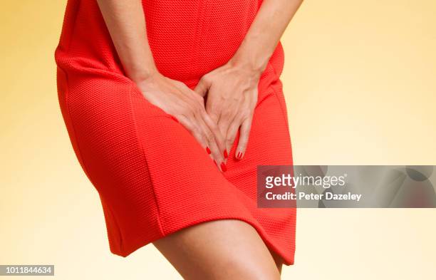 woman being caught short for toilet - pms stock pictures, royalty-free photos & images