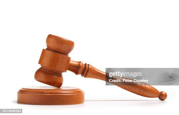 wooden gavel, side on, on white background - martelo justiça imagens e fotografias de stock