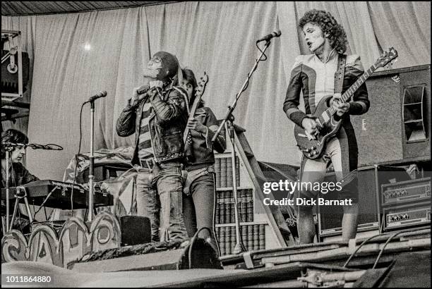 The Sensational Alex Harvey Band perform on stage at Stoke City Football Club, United Kingdom, 17th May 1975. L-R Hugh McKenna, Alex Harvey, Chris...