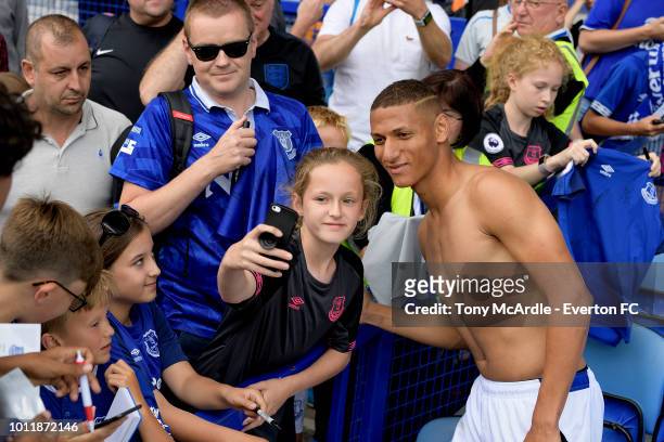 Richarlison of Everton with fans after the pre-season friendly match between Everton and Valencia at Goodison Park on August 4, 2018 in Liverpool,...