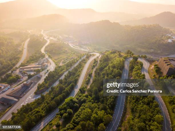 road in the mountains - carretera paisaje vista aerea fotografías e imágenes de stock