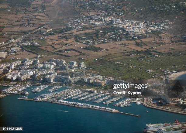 europe, spain, balearic isles, ibiza, 2018: aerial view of san antonio and coastline - sant antoni de portmany stock pictures, royalty-free photos & images