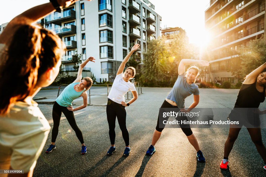 Urban Fitness Group Warming Up For Run