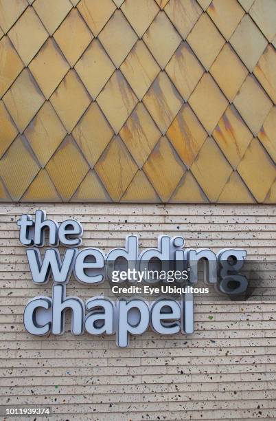 England, Lancashire, Blackpool, Seafront promenade with Wedding Chapel sign and exterior detail.