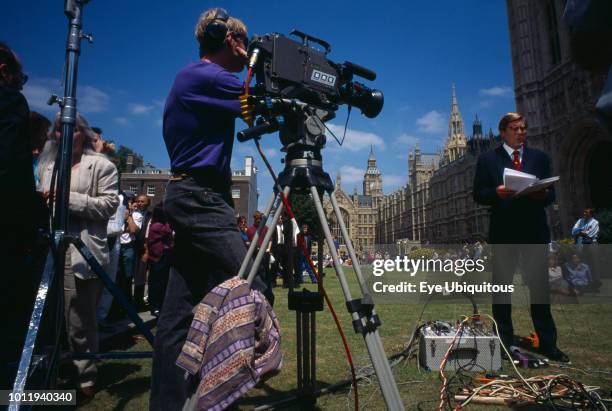 England, London, Media, TV Crew, BBC News live broadcast outside the Houses of Parliament during re-election of John Major and the Conservatives in...