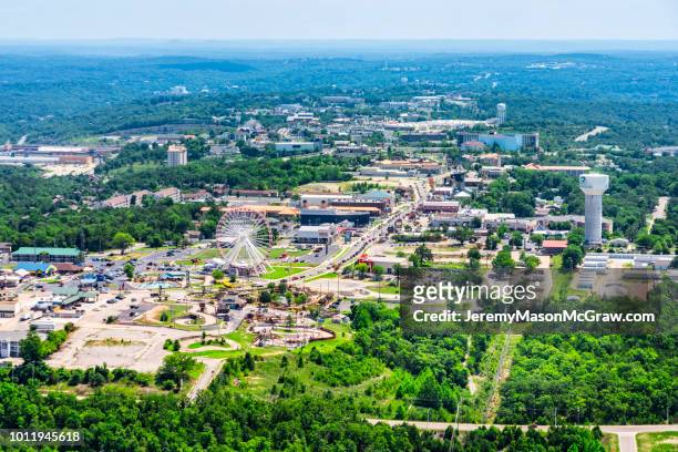 daytime aerial view of hwy 76, branson missouri - 1011957648,1011945618,1011950492,1011960800,1011954950,1011953954,1015768380,1015768366,1015768370,1015768372,1015768382,1015768398,1015768412,1015768410,1015768414,1015768418,1015768438,1015768448,1015768450,1015768488,1015768474,1015768478,1015768504,1015768508,1016083590,1016083634,1016083592,1016083608,1016083686,1016083708,1016083780,1016083774,1016083796,1016083828,1016083994,1016083992,1016083982,1016083980 stock pictures, royalty-free photos & images