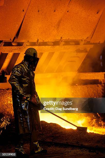 steel worker and blast furnace - in flames i the mask stock pictures, royalty-free photos & images