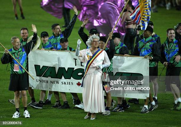 Participants from Team Vancouver march onto the field during the opening ceremony of the VI Gay Games in Sydney, 02 November 2002. The Gay Games run...