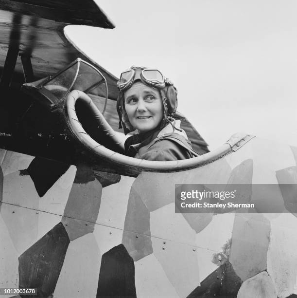 World War II ferry pilot and test pilot Joan Hughes on a Pfalz aircraft before doing a stunt fly for British war film movie 'The Blue Max', UK, 27th...