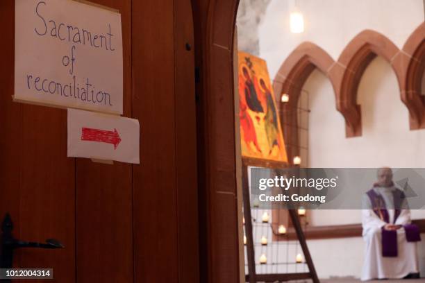Leonhardskirche. European Youth meeting of Taize in Basel. Sacrament of reconciliation. Basel. Switzerland.