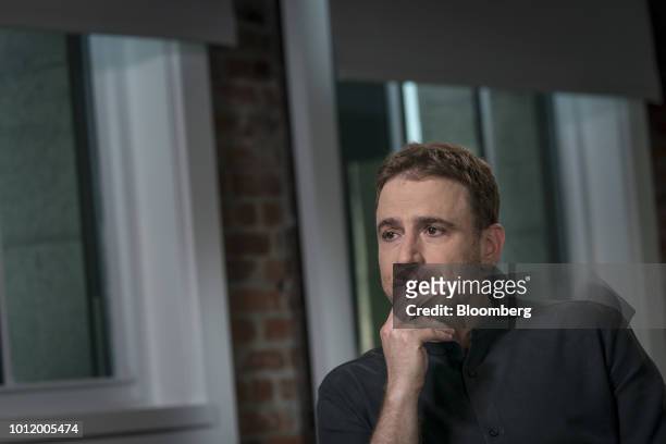Stewart Butterfield, co-founder and chief executive officer of Slack Technologies Inc., listens during a Bloomberg Studio 1.0 Television interview in...