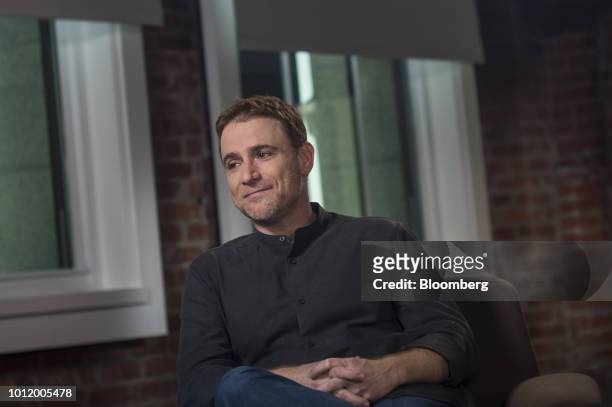 Stewart Butterfield, co-founder and chief executive officer of Slack Technologies Inc., listens during a Bloomberg Studio 1.0 Television interview in...