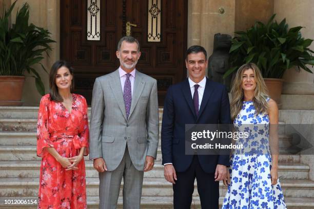 Queen Letizia of Spain, King Felipe of Spain, Prime Minister Pedro Sanchez and his wife Maria Begona Gomez Fernandez are seen at Marivent Palace on...