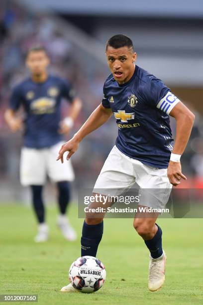 Alexis Sanchez of Manchester plays the ball during the friendly match between Bayern Muenchen and Manchester United at Allianz Arena on August 5,...