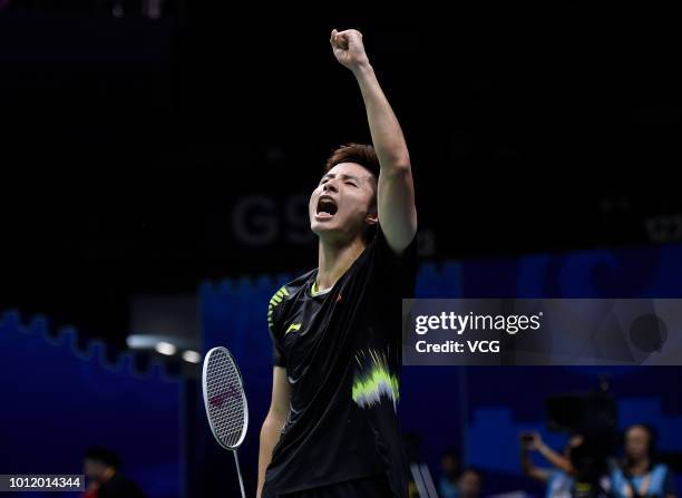 Shi Yuqi of China celebrates after winning the Men's Singles eighth-final match against Lin Dan of China on day four of TOTAL BWF World Championships...