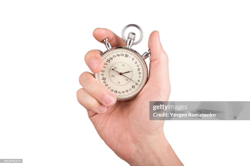 Hand with a stopwatch. Isolated on white background.
