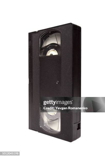 old video tape isolated on white background - audiocassette stock-fotos und bilder