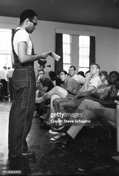 American Civil Rights activist Bob Moses speaks with a classroom of student volunteers, Oxford, Ohio, 1964.