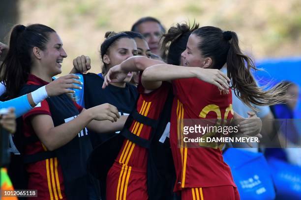 Spain's forward Claudia Pina celebrates with teammates after scoring a goal during the Women's U20 World Cup Group C football match between Paraguay...