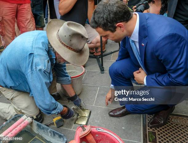 Slovenian Parliament Speaker Matej Tonin and German artist Gunter Demnig lay a block installation in the city center to remember the Slovenian Jews...