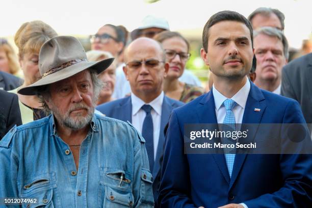 Slovenian Parliament Speaker Matej Tonin and German artist Gunter Demnig stand ahead of the laying the first Stumbling Stone on August 6, 2018 in...