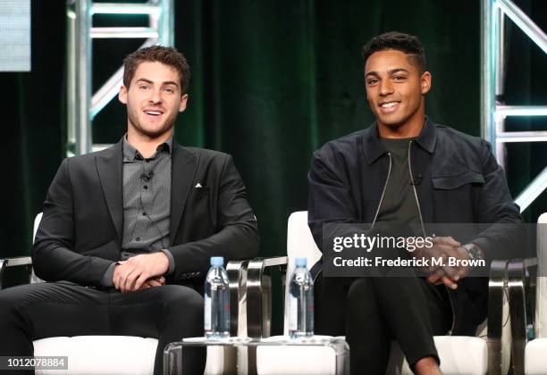 Cody Christian and Michael Evans Behling from "All American" speak onstage at the CW Network portion of the Summer 2018 TCA Press Tour at The Beverly...