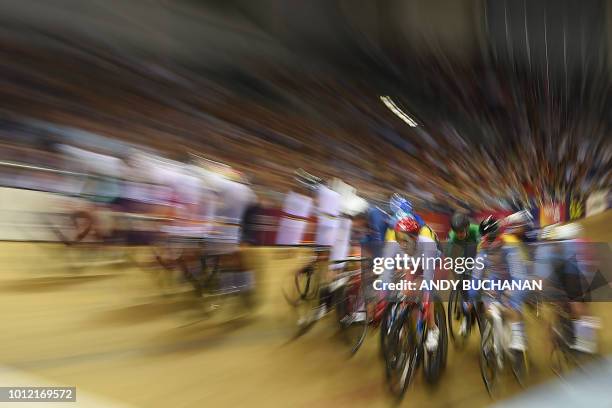 The riders compete in the women's omnium elimination race of the track cycling at the Sir Chris Hoy velodrome during the 2018 European Championships...