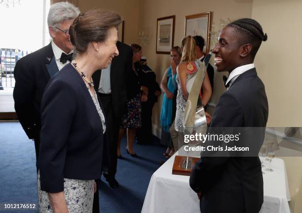 Princess Anne, Princess Royal, Admiral of the Royal London Yacht Club chats with Young Sailor of the Year Montel Jordan during the Royal London Yacht...