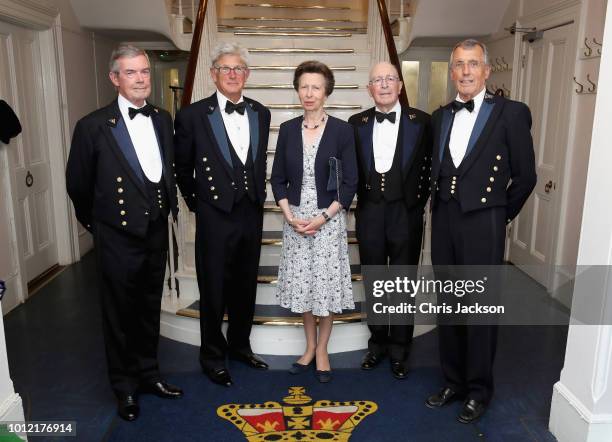 Princess Anne, Princess Royal, Admiral of the Royal London Yacht Club poses with Commodore David Gower and Vice Commodore HH Judge N Jones , Rear...