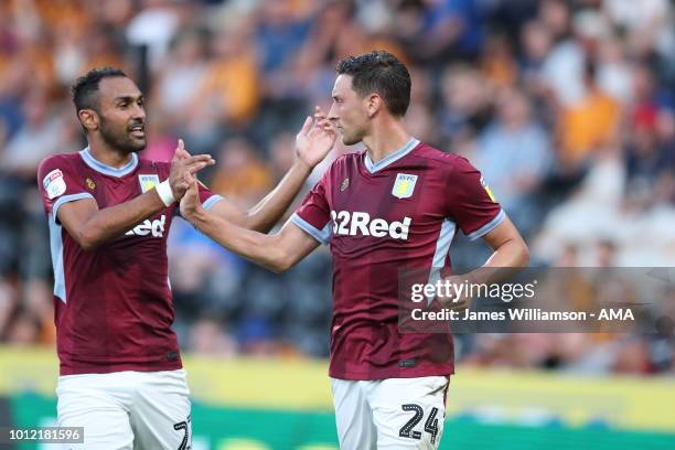 Tommy Elphick of Aston Villa celebrates after scoring a goal to make it 1-1 during the Sky Bet Championship match between Hull City and Aston Villa...
