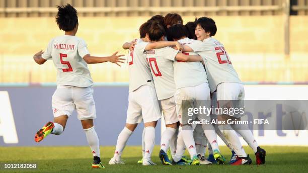 Honoka Hayashi of Japan celebrates her team's first goal with team mates during the FIFA U-20 Women's World Cup France 2018 group C match between USA...