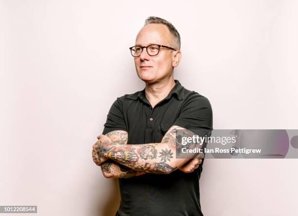 middle-aged man with tattoos - man tatoo bildbanksfoton och bilder